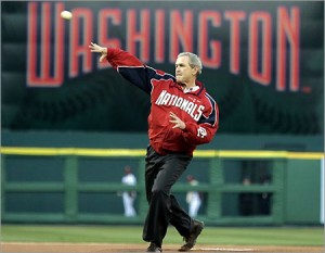 President George W. Bush throws out the first pitch at a Washington Nationals game.