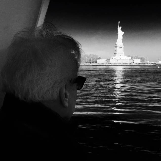 My friend Robert Pharr of Dallas, Texas, looks upon Lady Liberty on a recent visit to New York. (Copyright 2015, John Robert Pharr)